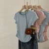 Crew neck shoulder short-sleeved women's T-shirt 2026 summer new design slimming pullover pleated versatile cropped base top - Light blue